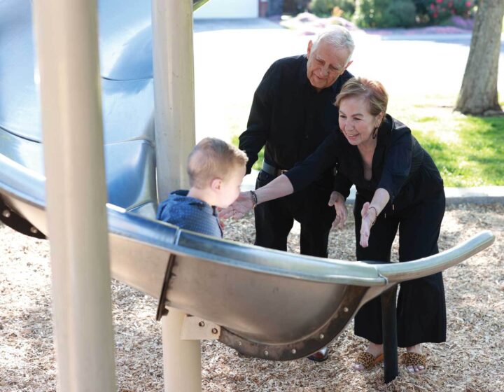 Couple with their grandson at the playground at Bethany