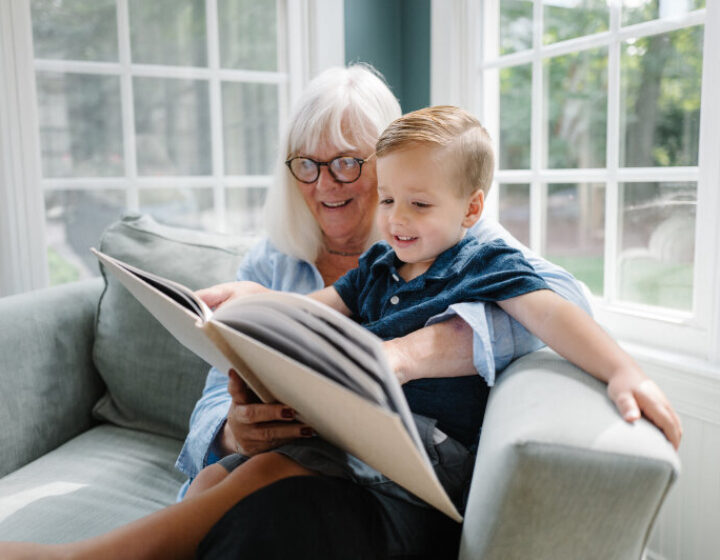 Resident reading to her grandson.