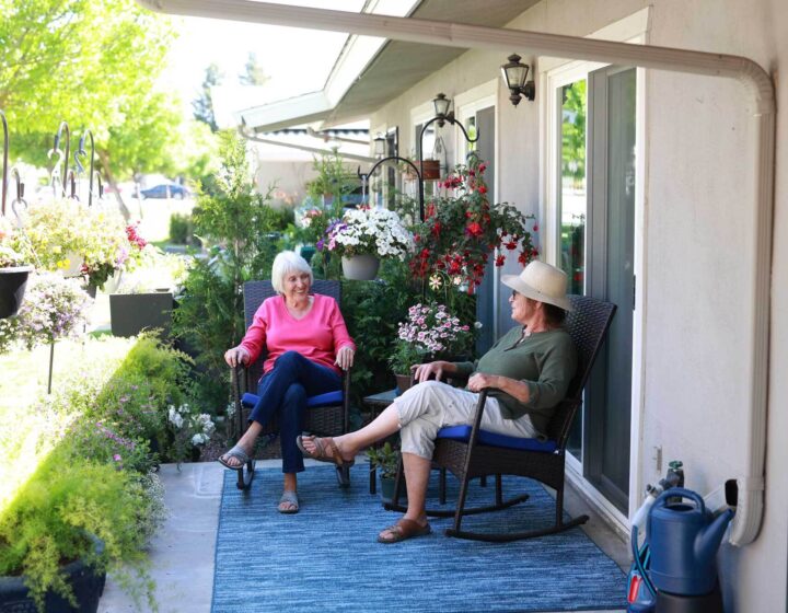 Residents relaxing on the patio