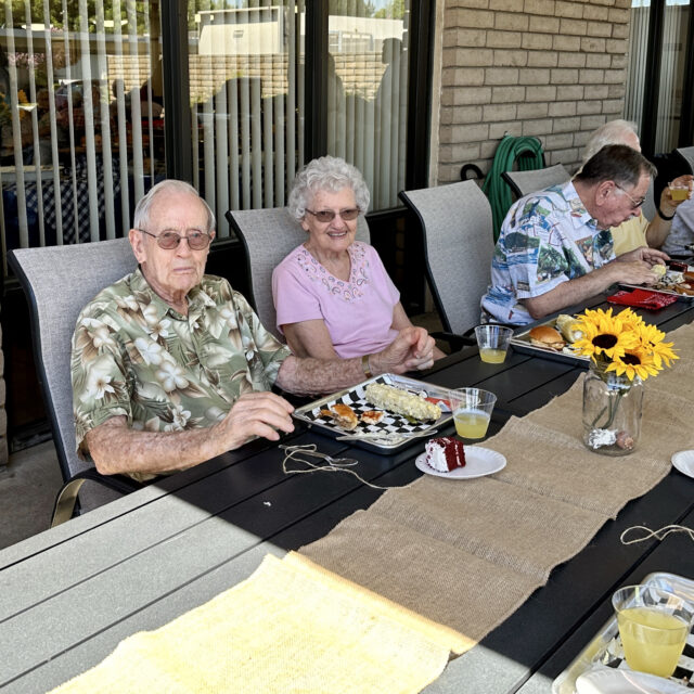 Residents dining outdoors at a Bethany event