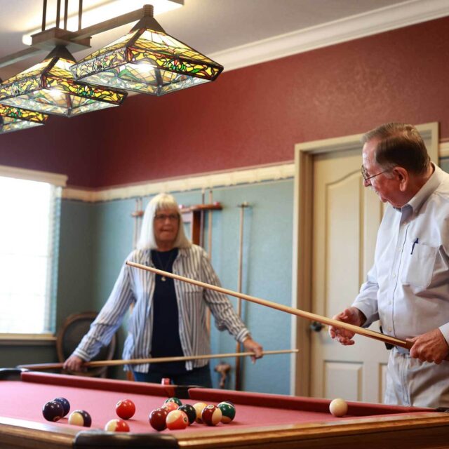 Bethany residents playing billiards