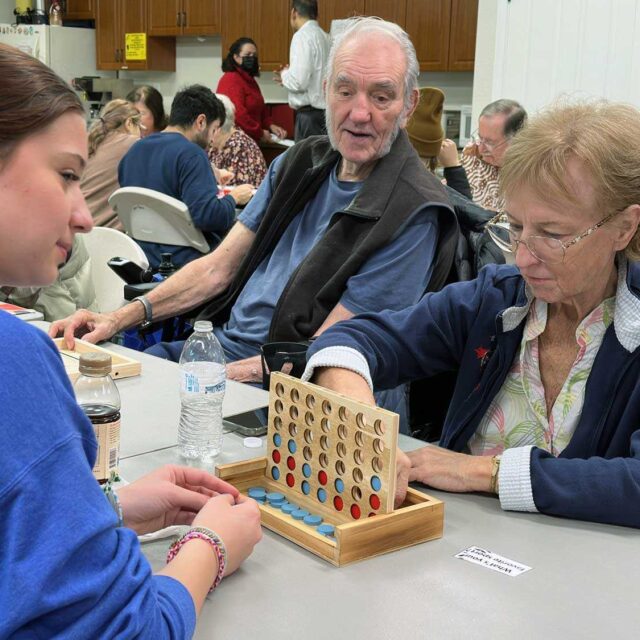 Intergenerational group playing games at Bethany